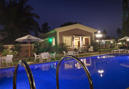Night Exterior View with pool at goaround villa in Goa