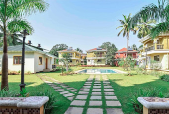 Exterior view of a pathway garden with a pool villa