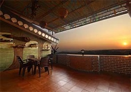 Scenic sunset view from the terrace of Hill Top Luxury Villa in Goa