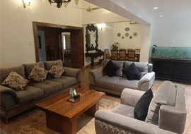 Spacious living room with modern sofas and wooden coffee table