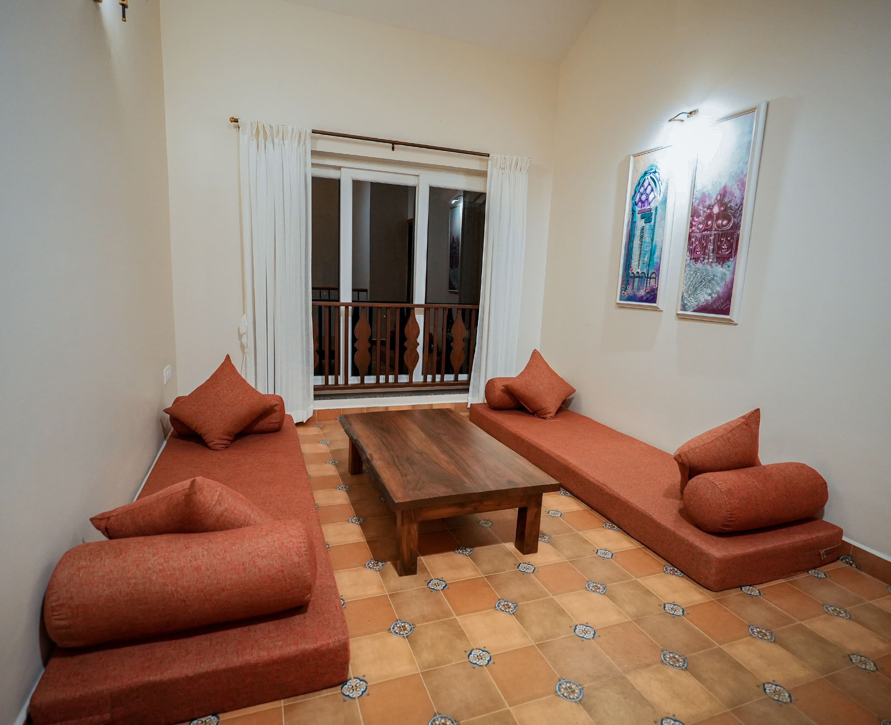 Hall area with low seating and wooden center table