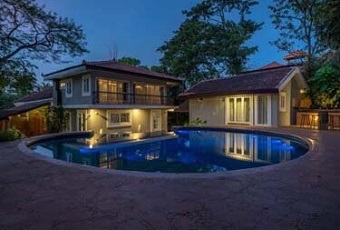 Exterior night view with pool at Scilla Azores Luxury villa in Anjuna, Goa