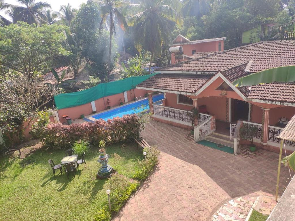 Top exterior view of a private pool at Kal Villa in Calangute