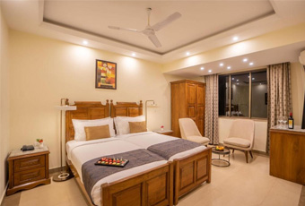 Spacious twin beds at GoAround Villa in Candolim