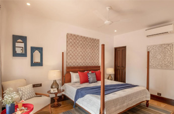 Luxury villa bedroom with four-poster bed and elegant decor